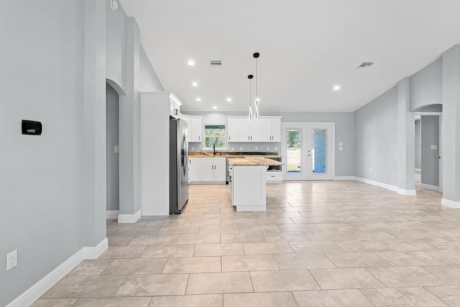 Finished open kitchen and living area in the Archer home